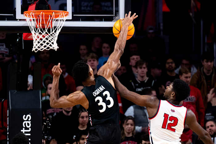 Cincinnati Bearcats forward Ody Oguama (33) blocks Detroit Mercy Titans forward Jordan Phillips (12) in the first half of the NCAA men s basketball game at Fifth Third Arena in Cincinnati on Wednesday, Dec. 21, 2022. Ncaa Basketball Detroit Mercy Titans At Cincinnati Bearcats